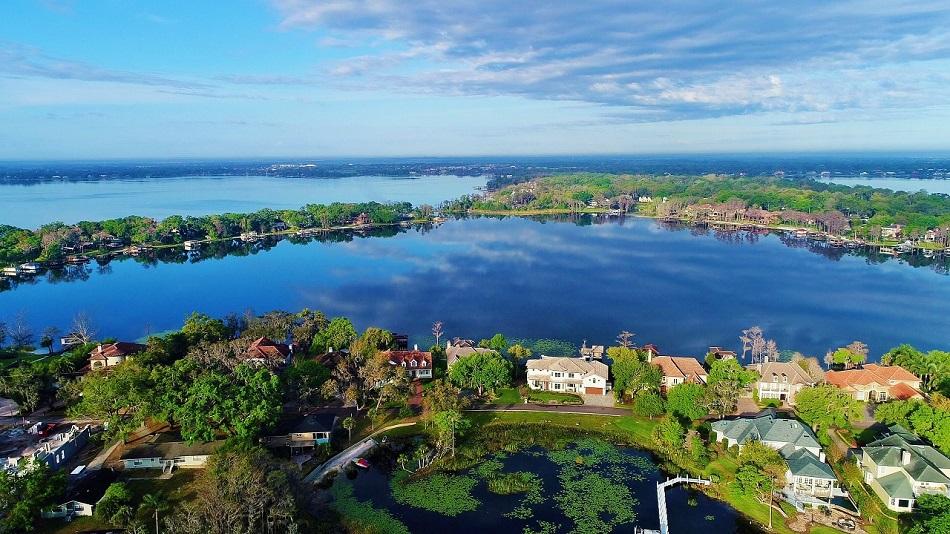 Aerial view of the Butler Chain of Lakes with lakefront homes and open blue water