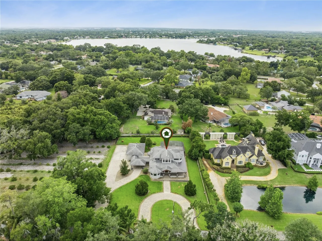 Aerial view of the property with Lake Butler in the background